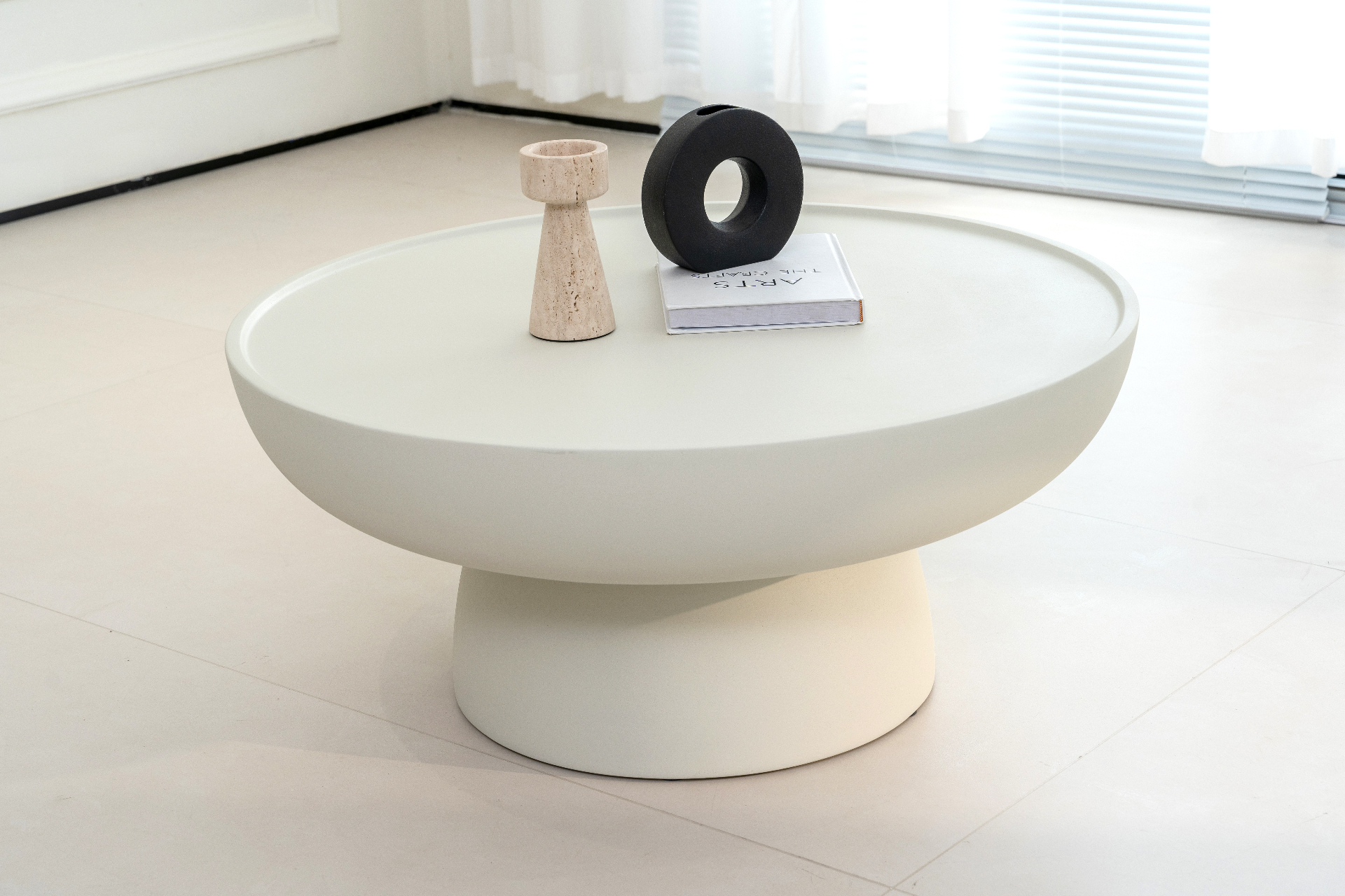 Cream pedestal coffee table